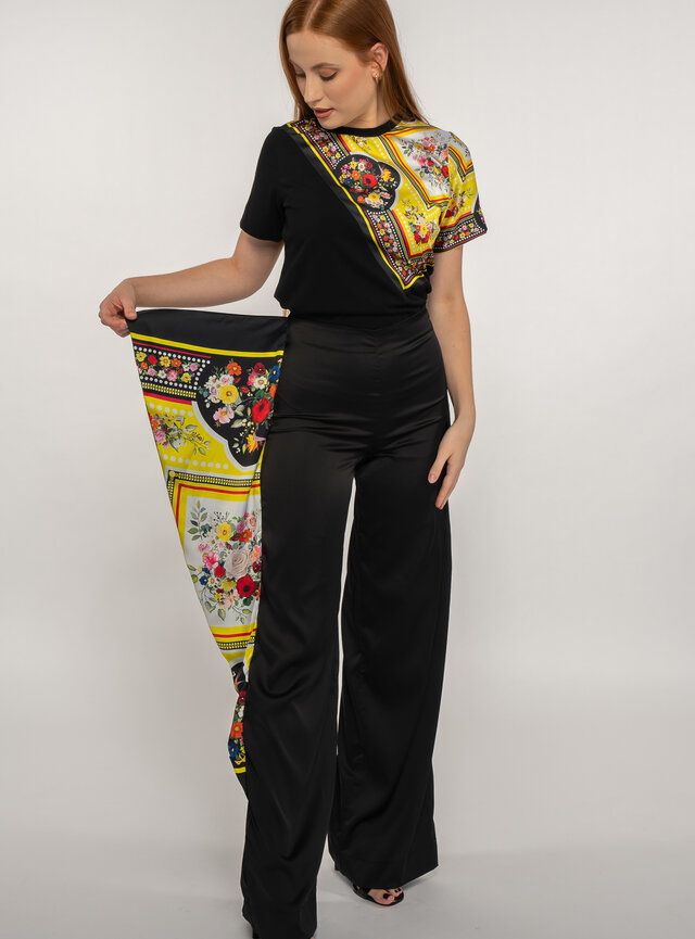 Dámske čierne nohavice dlhé s kvetovanou potlačou