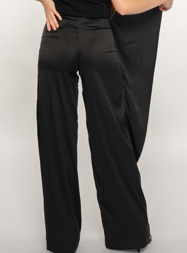 Dámske čierne nohavice dlhé s kvetovanou potlačou