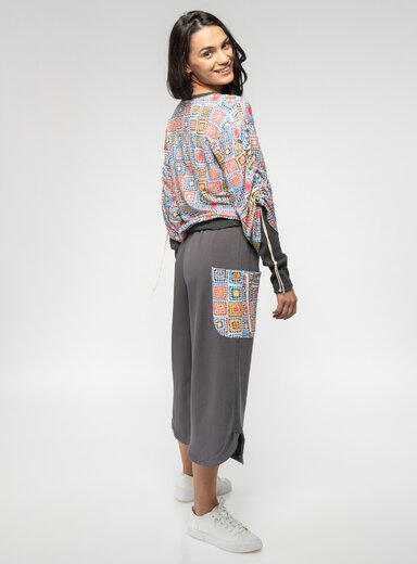 Dámske nohavice s vreckom pod kolená 