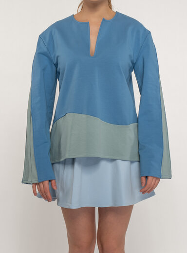 Dámsky top s dlhým rukávom v pastelovo modrej farbe