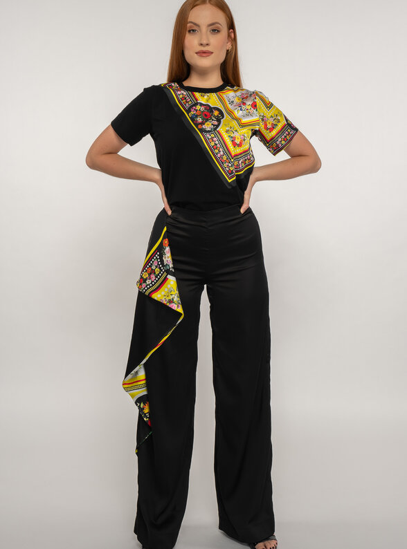 Dámske čierne nohavice dlhé s kvetovanou potlačou